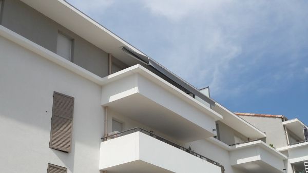 pose de store à plan de cuques