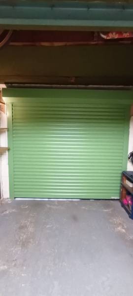 installation d'une porte de garage enroulable en maison individuelle à marseille