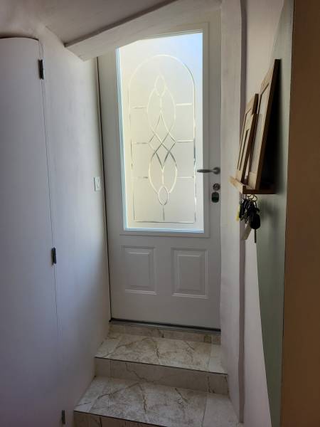 installation d'une porte en acier en réno sur marseille 13013 en maison individuelle