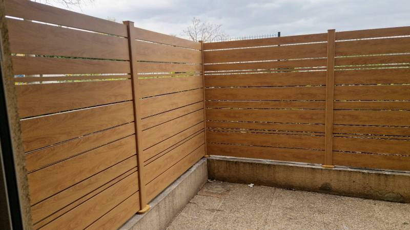 Installation d'une clôture en Aluminium chêne irlandais à Marseille 13015