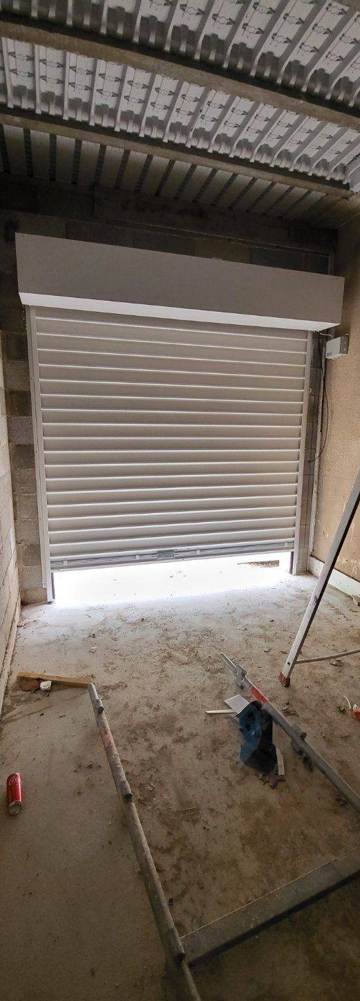 pose de 2 rideaux métalliques